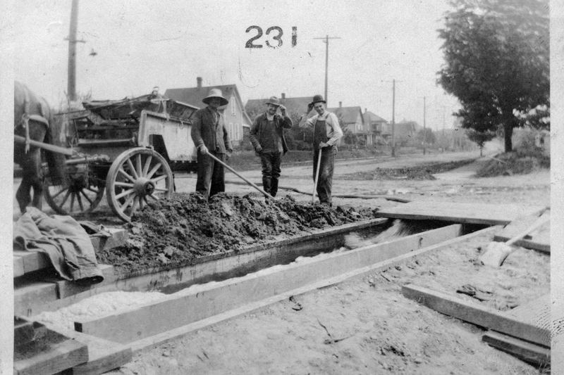 Workers cleaning Seattle's north trunk sewer sand catcher, circa 1918 (23167044644)